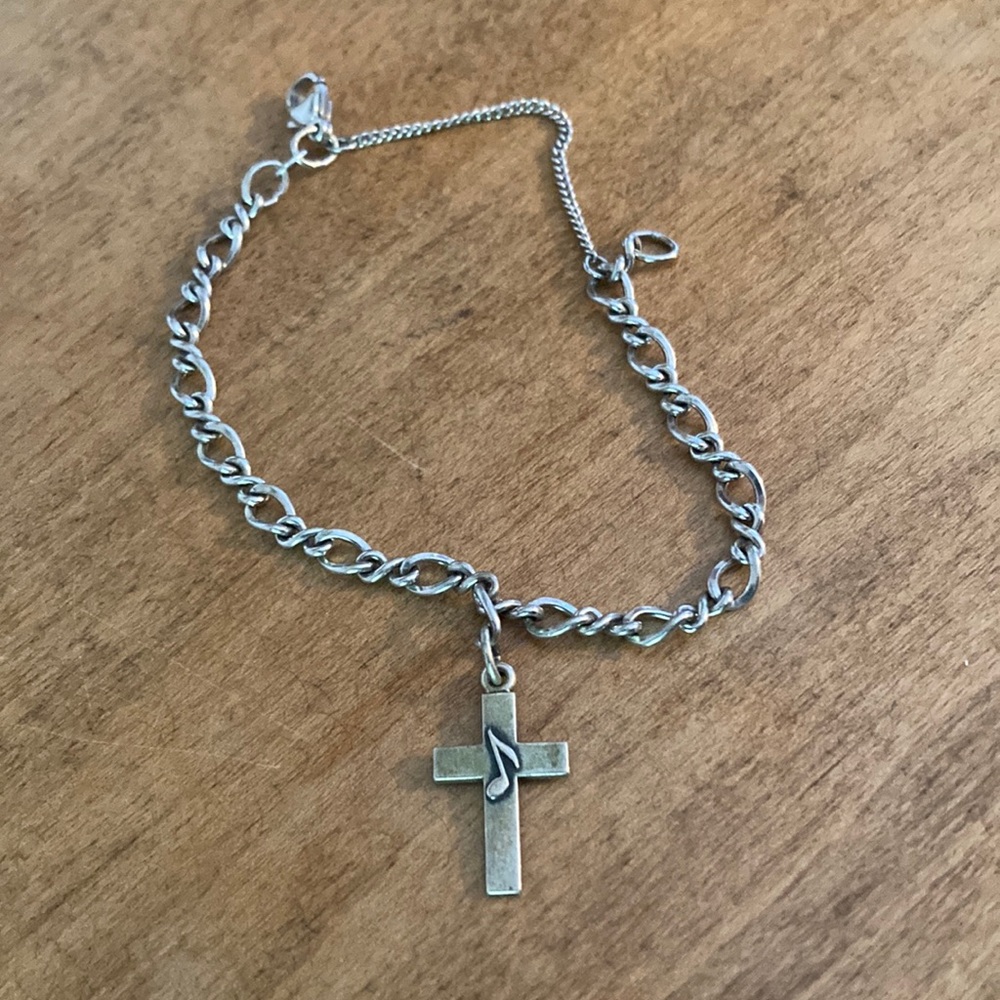 James Avery silver bracelet with cross and music note. Retail price $50